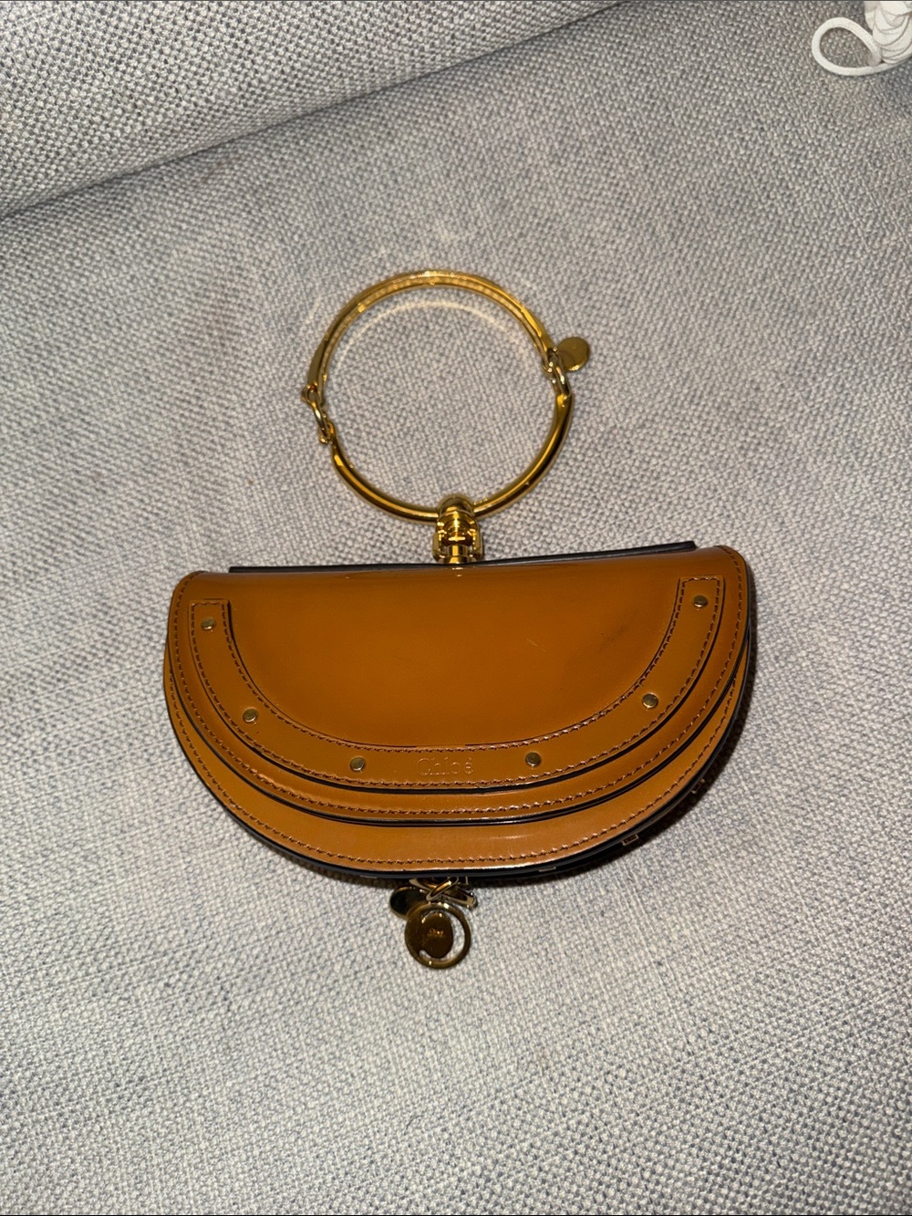 Chloé Cognac Leather Half-Moon Wristlet with Gold Bracelet Handle
